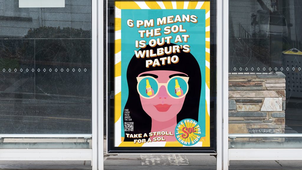 A poster being on the street stating "6 pm means the Sol is out at Wilbur's patio. Take a stroll for a Sol."